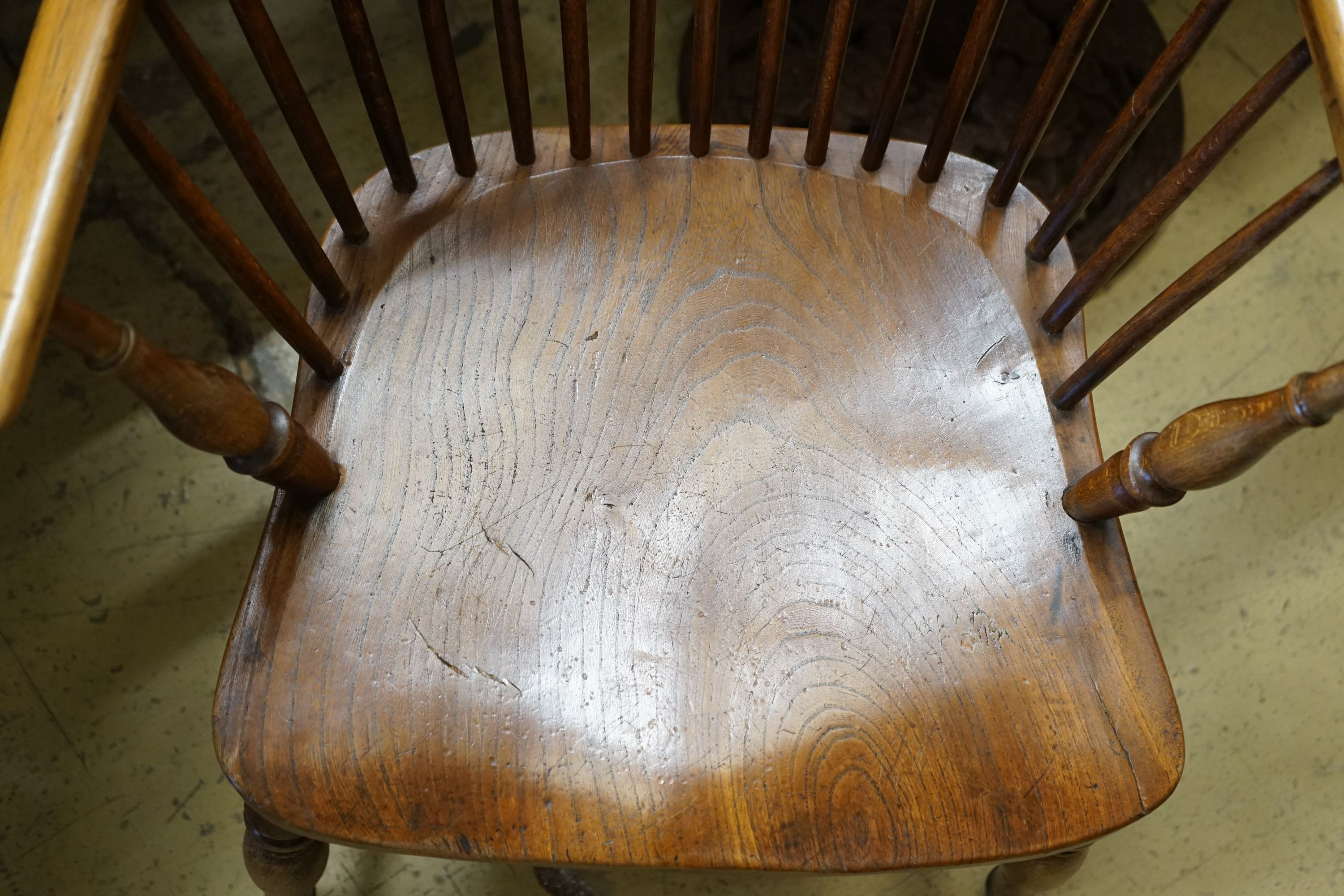 A mid 19th century ash and beech Windsor comb back armchair, width 56cm depth 43cm height 102cm